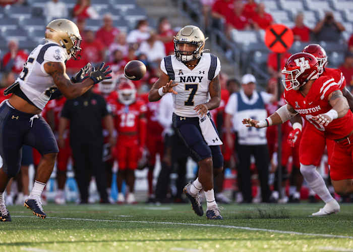 Xavier Arline is the man at the controls of the Navy offense, playing quarterback and operating its triple-option attack.